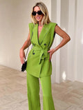 Neon green sleeveless coat and pant